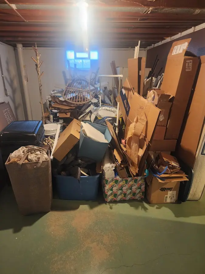 Roll-off dumpster container at job site for 4 Yard Dumpster Rental in Cedar Mill